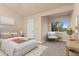 Relaxing bedroom featuring a cozy seating area near a bright window at 2154 Concord Ln, Superior, CO 80027