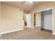 Bedroom featuring vaulted ceiling, neutral carpet and mirrored closet at 2154 Concord Ln, Superior, CO 80027