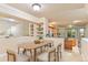 Bright dining area with adjacent mirror wall, built-in shelving, and easy kitchen access at 2154 Concord Ln, Superior, CO 80027