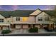 Well-maintained townhomes with attached garages and covered parking at 2154 Concord Ln, Superior, CO 80027