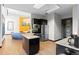 Community kitchen space featuring stainless steel appliances, granite countertops, and modern dark wood cabinets at 2154 Concord Ln, Superior, CO 80027