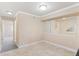 Spacious living room featuring neutral walls, tile flooring, and a mirrored wall at 2154 Concord Ln, Superior, CO 80027