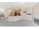 Combined living space featuring kitchen, fireplace, and open floor plan at 2154 Concord Ln, Superior, CO 80027