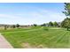 Inviting park showcasing well-manicured lawn, picnic tables, and volleyball area at 2154 Concord Ln, Superior, CO 80027