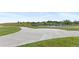 Well-maintained tennis and pickleball courts with fresh concrete, surrounded by green spaces and residential views at 2154 Concord Ln, Superior, CO 80027