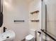 A well-appointed bathroom featuring modern fixtures, sleek lines, and contemporary design elements at 2849 S Bannock St, Englewood, CO 80110