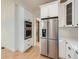 Gourmet kitchen with stainless steel refrigerator and oven at 2849 S Bannock St, Englewood, CO 80110
