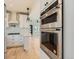 Close up of stainless steel microwave and oven in modern updated kitchen at 2849 S Bannock St, Englewood, CO 80110