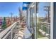 Spacious balcony with city views and comfortable seating at 1488 Madison St # 310, Denver, CO 80206