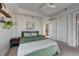 Charming bedroom with en-suite bathroom and neutral decor at 1488 Madison St # 310, Denver, CO 80206