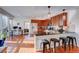 Modern kitchen with granite countertops and wood cabinets at 1488 Madison St # 310, Denver, CO 80206