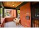 Front porch features a tiled floor and wooden bench at 2135 N Gilpin St, Denver, CO 80205