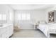 Bright bedroom with white furniture and a hanging chair at 3330 S Columbine Cir, Englewood, CO 80113