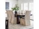 Elegant dining room with a long wood table and neutral-toned chairs at 3330 S Columbine Cir, Englewood, CO 80113