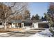 Stunning curb appeal featuring a remodeled Ranch home and landscaped yard at 3330 S Columbine Cir, Englewood, CO 80113