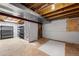 Unfinished basement presents a blank canvas for customization, with exposed beams and concrete floors at 3529 Huron Peak Ave, Superior, CO 80027