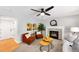 Cozy living room with a fireplace, plush seating, ceiling fan, and a neutral color scheme for relaxation at 3529 Huron Peak Ave, Superior, CO 80027