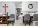 Kitchen with a small dining area and view into living room at 1190 Elmira St, Aurora, CO 80010