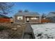 Cute bungalow home with a well-maintained lawn and walkway at 1190 Elmira St, Aurora, CO 80010