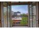 Relax and enjoy the cityscape view through French doors from this private balcony at 191 Clayton Ln # 402, Denver, CO 80206
