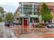 Street view of North Italia restaurant in a commercial shopping center and brick paved street in a bustling urban setting at 191 Clayton Ln # 402, Denver, CO 80206