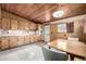 View of the kitchen shows wood cabinets and a dining table with seating area at 7105 Flagstaff Rd, Boulder, CO 80302