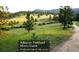 Serene view of Myer's Gulch parkland a quick bike ride or drive away with beautiful fields at 7105 Flagstaff Rd, Boulder, CO 80302
