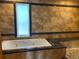 Relaxing bathroom with a jacuzzi tub, granite accents, and natural light at 1123 S Quince Way, Denver, CO 80231