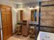 Stylish bathroom featuring vessel sinks, granite accents and tiled walls at 1123 S Quince Way, Denver, CO 80231