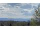 Distant mountain views from this property offering a serene backdrop at 1123 S Quince Way, Denver, CO 80231