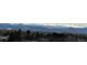 Panoramic mountain views stretching across the horizon from this property at 1123 S Quince Way, Denver, CO 80231