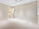Neutral bedroom with a walk-in closet, recessed lighting, and a window with blinds at 465 Monroe St, Denver, CO 80206