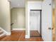 A home elevator provides easy access between floors; interior is painted bright white at 465 Monroe St, Denver, CO 80206