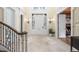 Bright and airy foyer with marble floors, paneled doorways, and high ceilings welcomes you at 465 Monroe St, Denver, CO 80206
