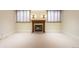 Cozy living room featuring a fireplace with a decorative mantel and sconce lighting at 465 Monroe St, Denver, CO 80206