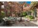 Relaxing outdoor patio featuring garden, stone and brick architecture, and an outdoor dining area at 465 Monroe St, Denver, CO 80206