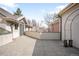 Spacious patio area with concrete pavers and neutral colored walls, great for outdoor entertaining or relaxing at 465 Monroe St, Denver, CO 80206