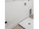 View of a laundry room with white walls and flooring at 7036 E 126Th Pl, Thornton, CO 80602