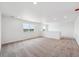 Upstairs loft featuring neutral carpeting and natural light from several windows at 7036 E 126Th Pl, Thornton, CO 80602