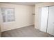 Comfortable bedroom with window, closet, and neutral carpet flooring at 1261 S Gilbert St # 202, Castle Rock, CO 80104