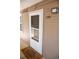 Close-up of the front door featuring the unit number, a welcome mat, and secure entry at 1261 S Gilbert St # 202, Castle Rock, CO 80104