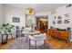 Inviting dining area features stylish decor and seamlessly connects to the adjacent kitchen at 2195 Decatur St # 212, Denver, CO 80211