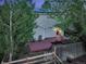 Aerial view showcasing the backyard deck and home exterior with solar panels at 4347 W Kenyon Ave, Denver, CO 80236