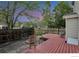 Backyard has a deck and seating area for outdoor entertaining and relaxation at 4347 W Kenyon Ave, Denver, CO 80236