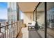 Relaxing balcony with comfortable seating, ideal for enjoying cityscape views at 1020 15Th St # 35N, Denver, CO 80202