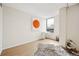 Bright bedroom featuring wood floors, neutral walls, and a large window for ample natural light at 1020 15Th St # 35N, Denver, CO 80202