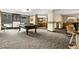 Community game room with billiards table and sitting area at 1020 15Th St # 35N, Denver, CO 80202