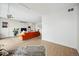 Cozy living room space featuring stylish decor, a cowhide rug, and great natural light at 1020 15Th St # 35N, Denver, CO 80202