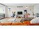 Welcoming living room space featuring decor, a blanket, media center and great natural light at 1020 15Th St # 35N, Denver, CO 80202