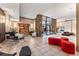 Modern lobby with stone accents, stylish seating, and ample natural light creating a welcoming atmosphere at 1020 15Th St # 35N, Denver, CO 80202